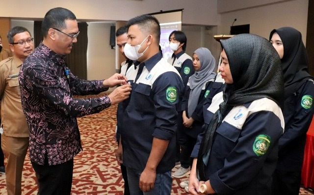 Kepala Diskominfo Kaltim HM Faisal saat pengukuhan Komunitas Informasi Masyarakat Kabupaten Kutai Kartanegara periode 2022 – 2025