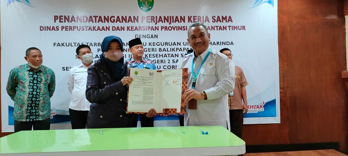 Penandatangan Kerjasama antara Dinas Perpustakaan dan Kearsipan Kaltim dengan Ojek Muslimah Samarinda (OMS) terkait layanan antar dan jemput buku Perpustakaan Kaltim